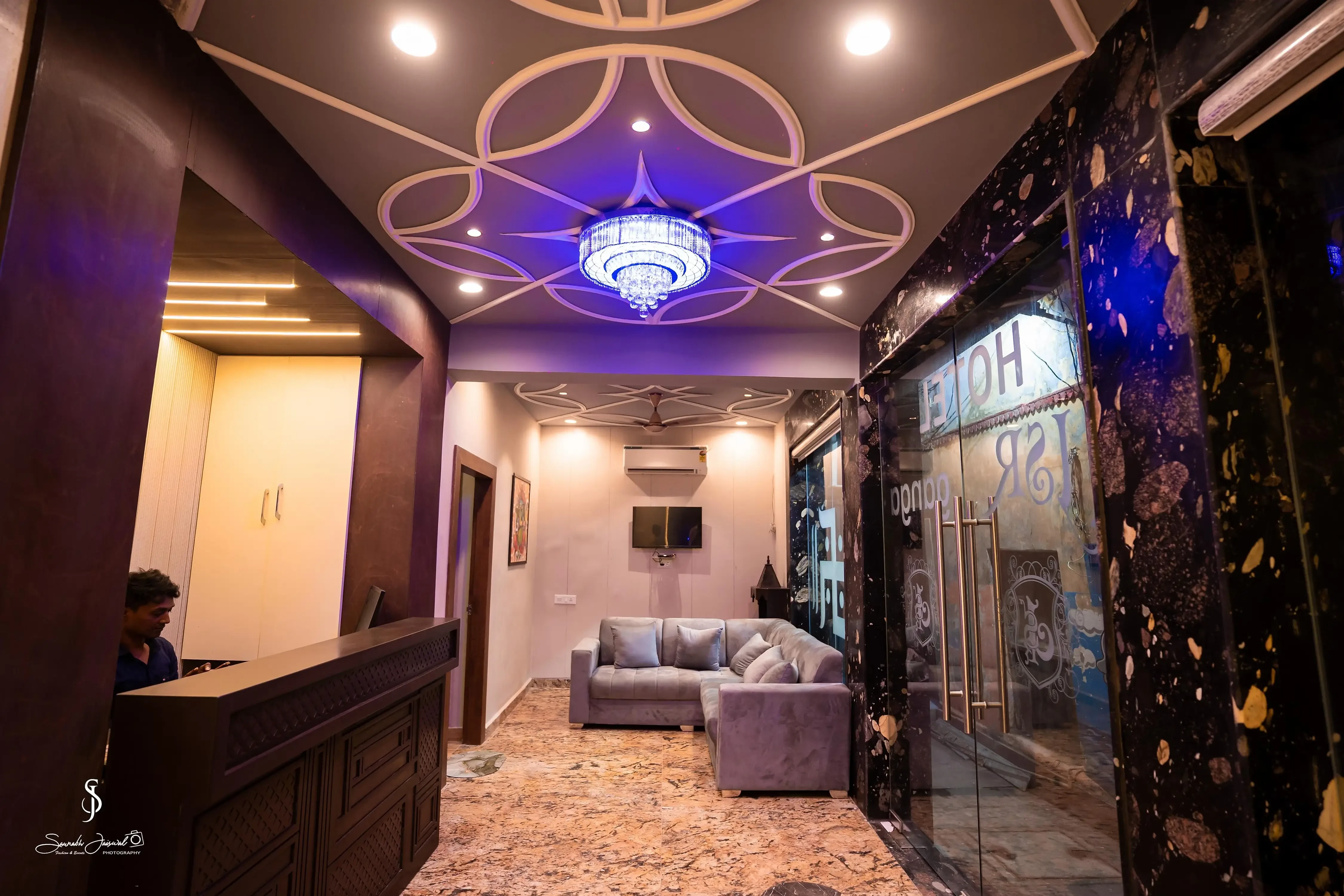 Hotel JSR Ganga Varanasi [Modern Reception Desk At Hotel Serene Stay With Staff Greeting Guests]