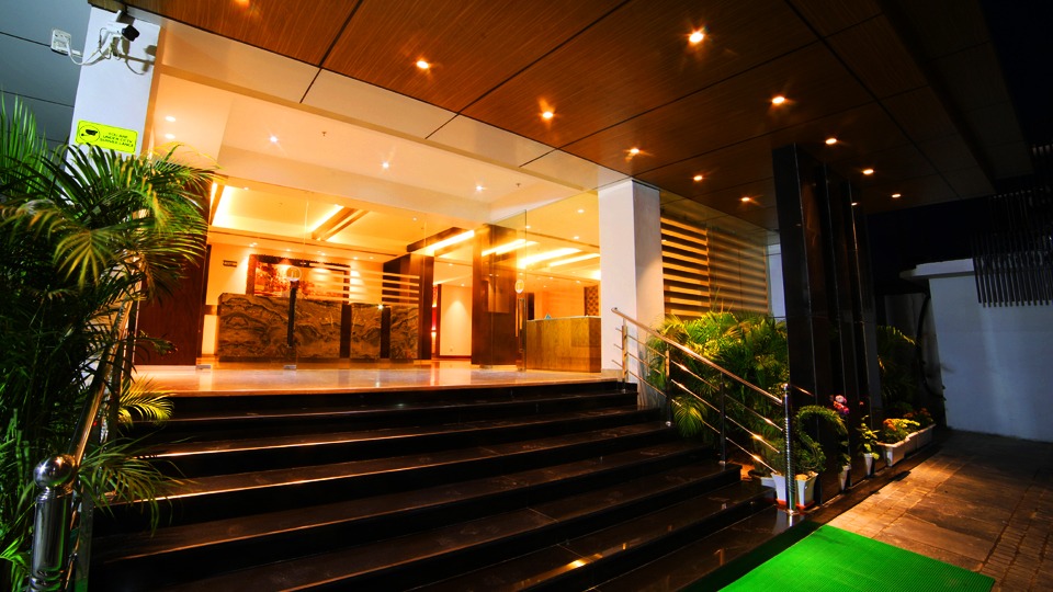 Hotel Le Lotus Grand Varanasi Varanasi [Welcoming Hotel Entrance With Glass Doors]