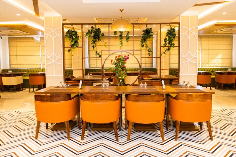 Hotel Naveen Continental Prayagraj [Family Dining Setup At Hotel Naveen Continental With Luxury Decor And Spacious Arrangement.]