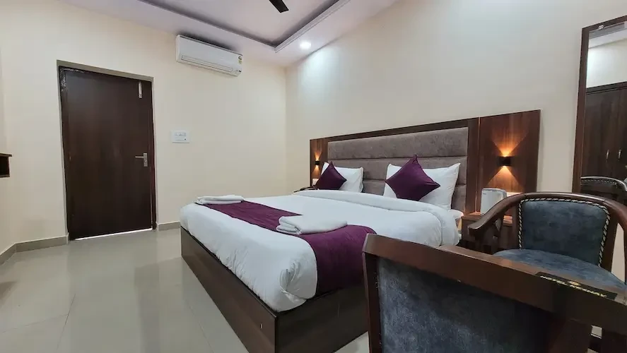 Hotel Keshav Nandan By The Shivaay Rishikesh [Elegant Private Sitting Area With Sofa And Center Table In  Room]